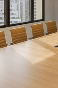 A sophisticated boardroom with enhanced design, reflecting Gumtree’s brand colours and identity.